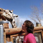 Curtis and a giraffe